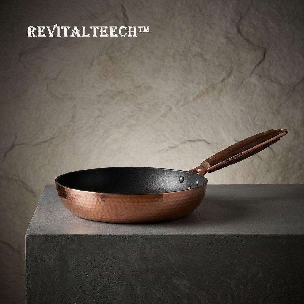 🍯Revitalteech™ THE COPPER-FUSION SKILLET "Precision is found at the intersection of flame and metal. A skillet designed to command heat, capturing the soul of the ingredient in a single, golden sear."