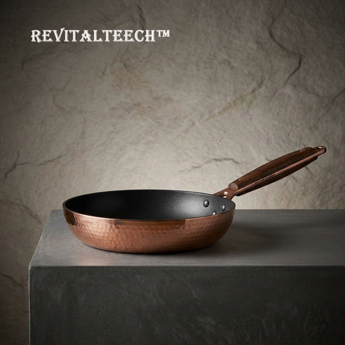 🍯Revitalteech™ THE COPPER-FUSION SKILLET "Precision is found at the intersection of flame and metal. A skillet designed to command heat, capturing the soul of the ingredient in a single, golden sear."